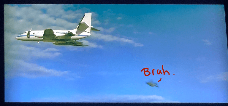 A large air plane flying in the sky

Description automatically generated